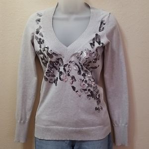 Express sweater with leopard embellishment